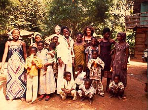 Ladybee ith the painter Twins Seven Seven and his family in Oshogbo, Nigeria, 1978 (Photo by Ladybee)