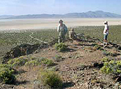 A few Earth Guardians explore the desert near the Cassidy Mine site.  The playa lies in the distant background.