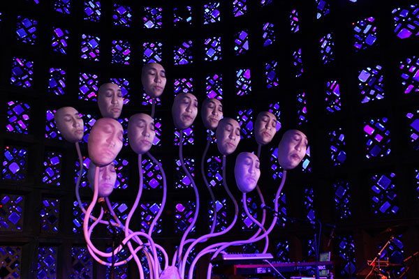 Global art grant recipient, 12 floating digital heads 