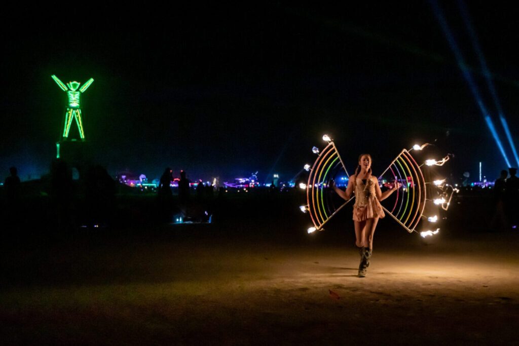 Fire Dancer with rainbow fire holders.