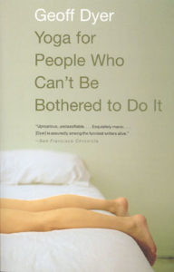 person laying facedown on a bed with bare legs showing