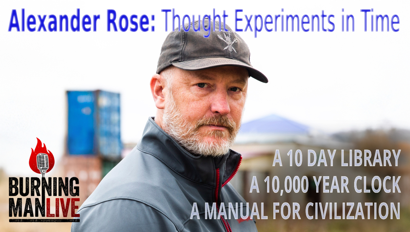 A man with dark cap looks into the camera