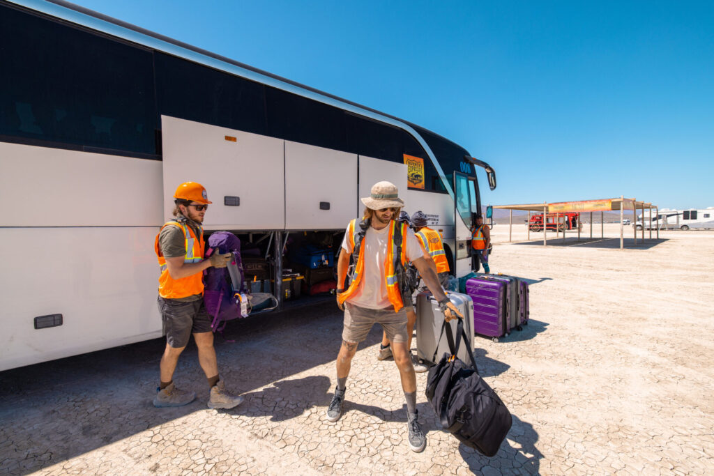 People unloading the Burner Express Bus