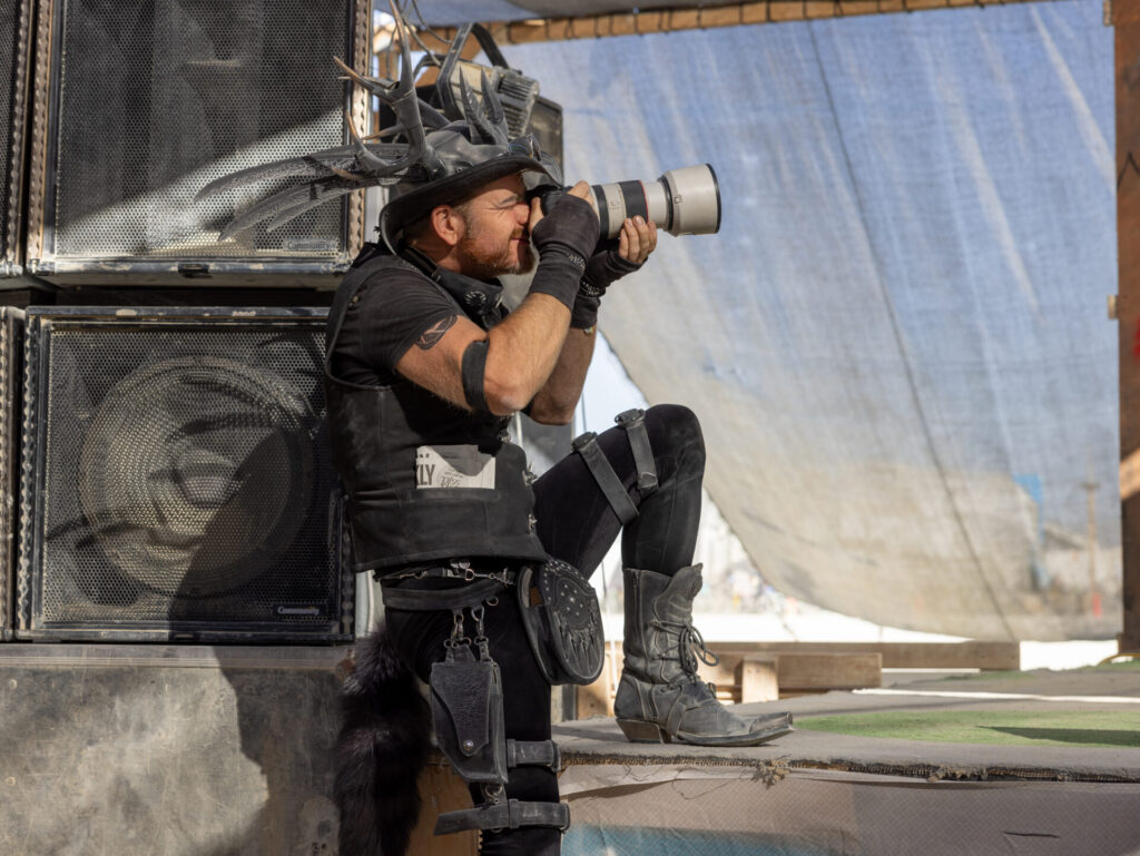 Capturing famous photographer, Jamen Percy, photographing an event at Center Camp