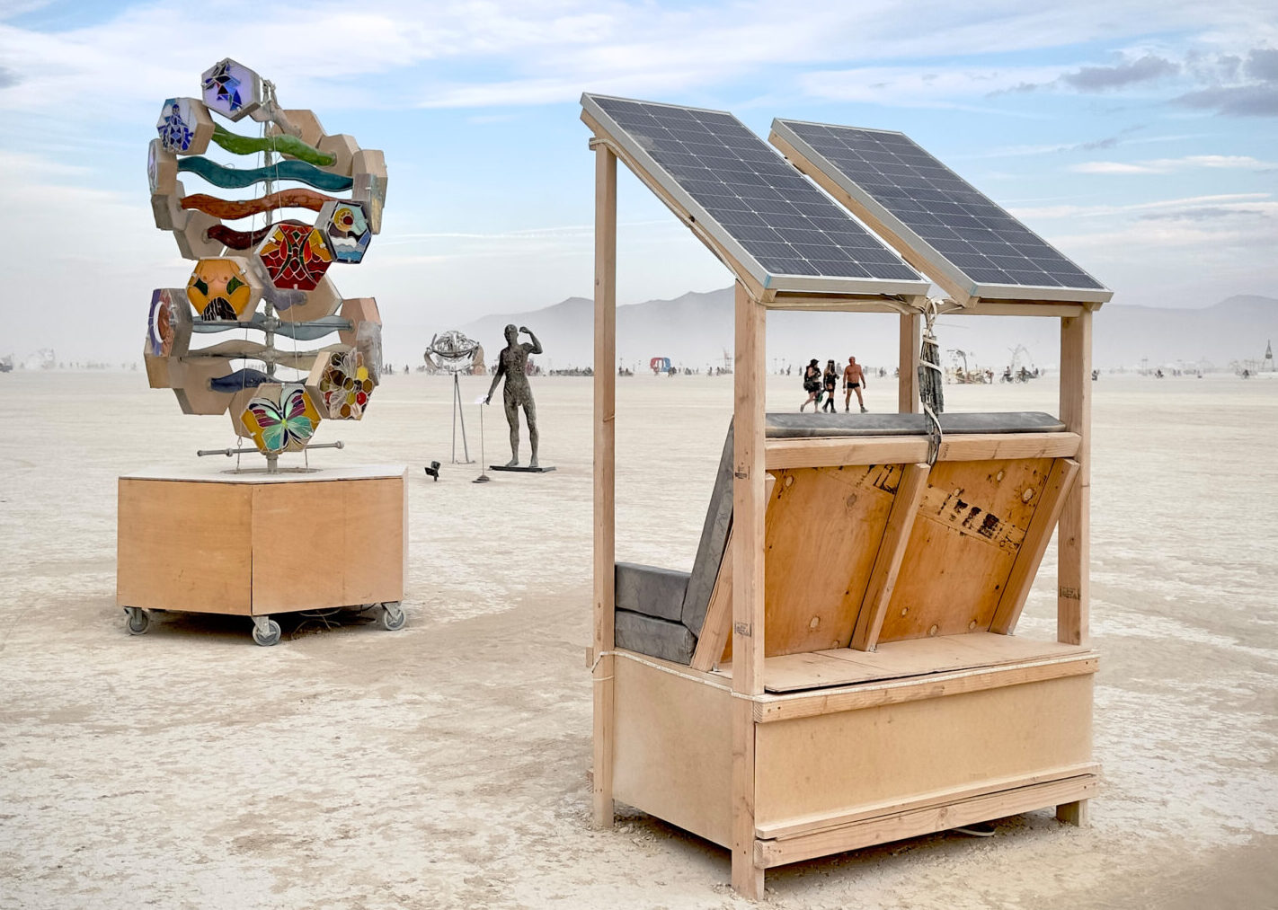 A bench seat for solar charging and battery storage, located in the 2023 Art Garden.