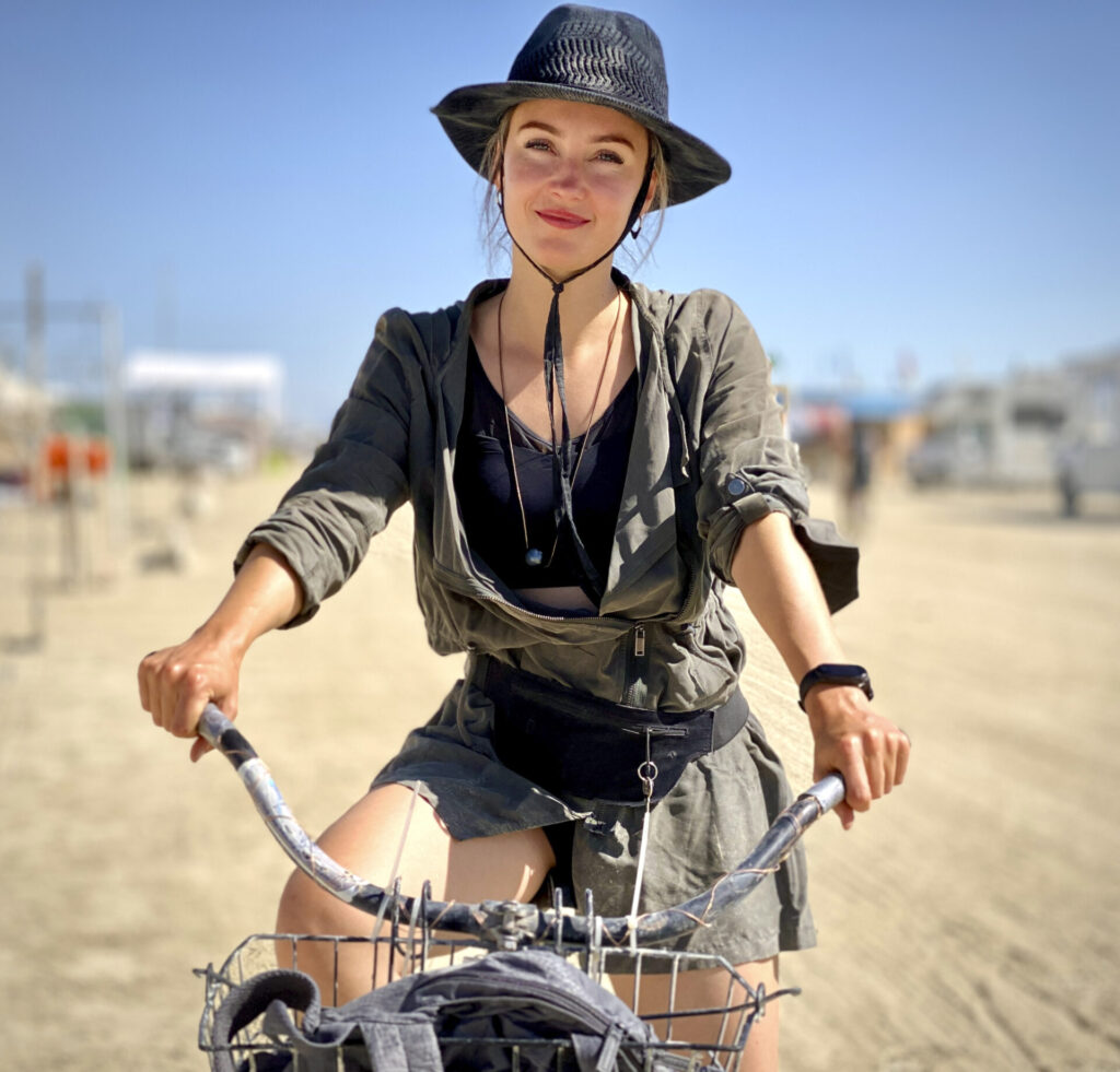 Woman on a bicycle in Black Rock City