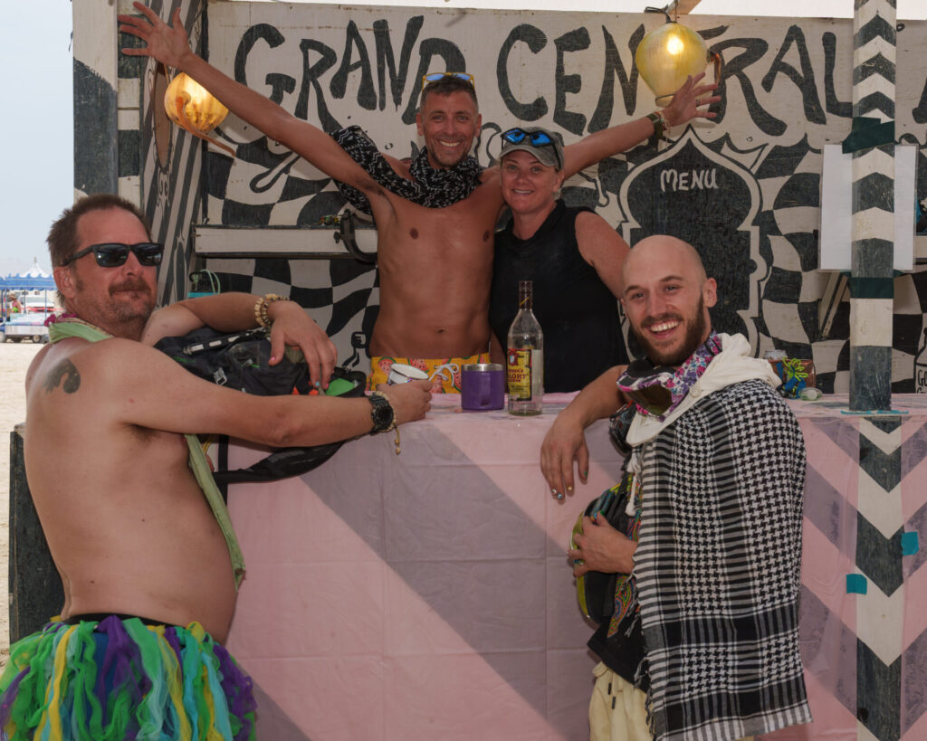 Burners with arms raised at Grand Central Bar 