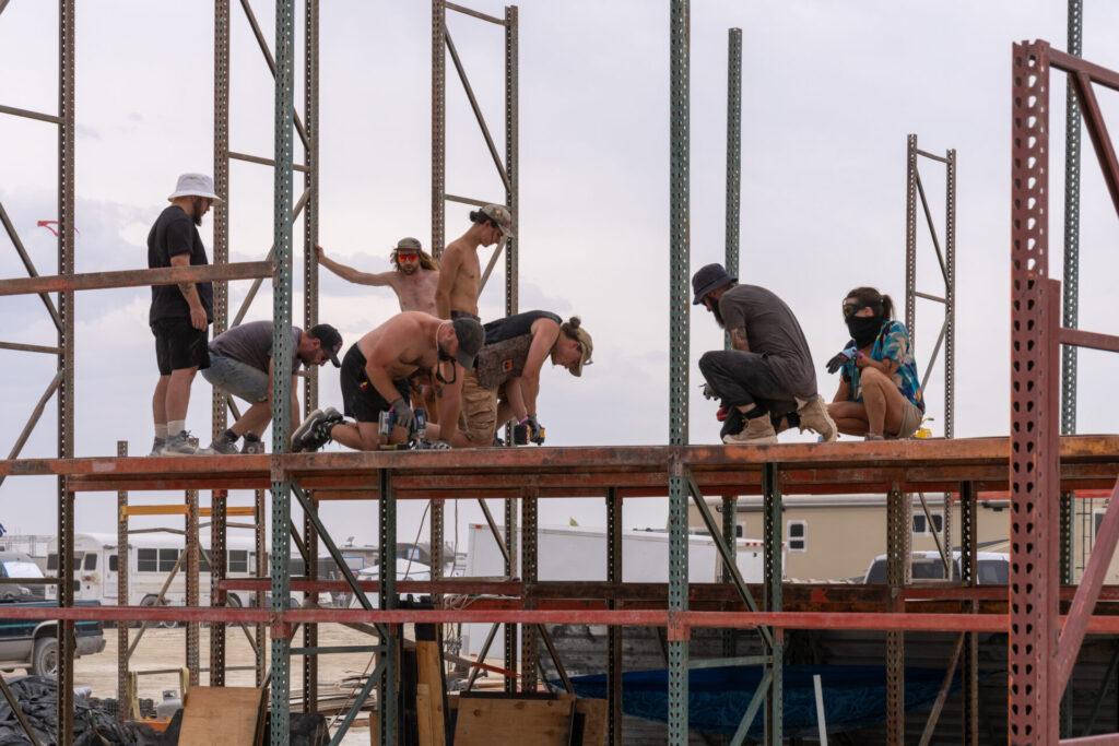 SK8 Camp members on scaffolding