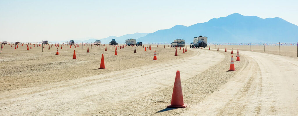 Gate Road during build week. A line of cars and RVs on Gate Road going into Burning Man