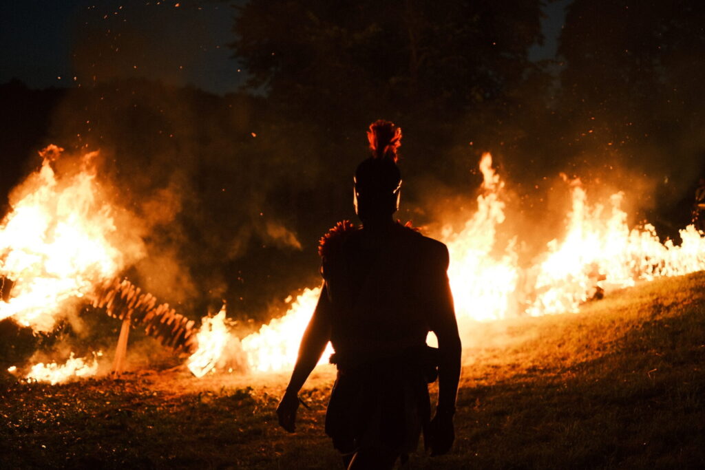 Person silhouette in flame