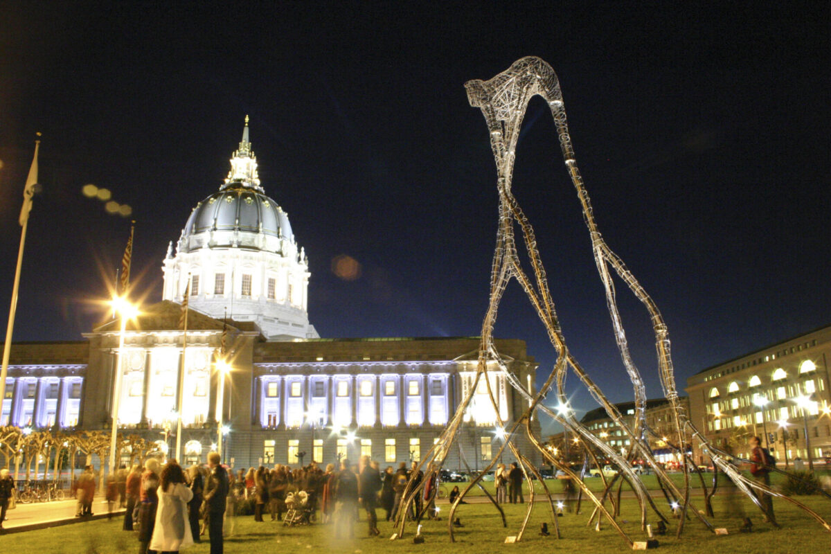 A spindly steel sculpture in front of San Francisco City Hall