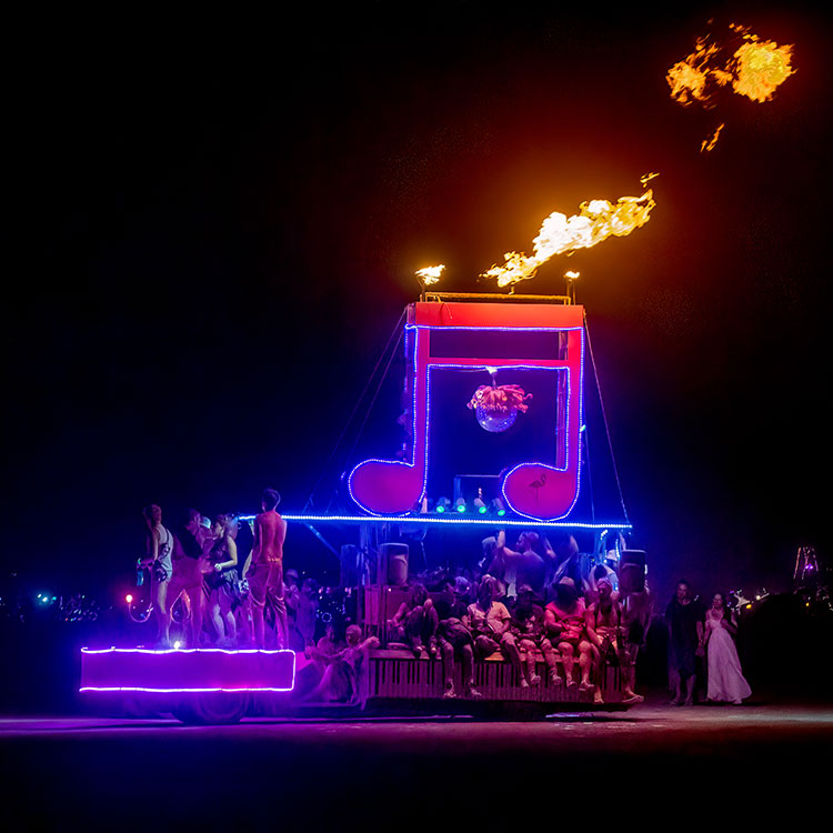 Gina, the pink piano shaped mutant vehicle with flaming musical note on top. 