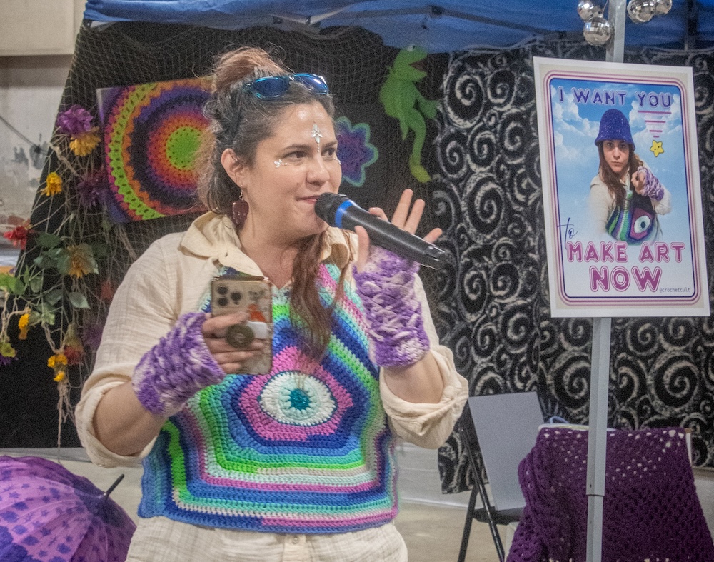 Woman with microphone at a regional event 