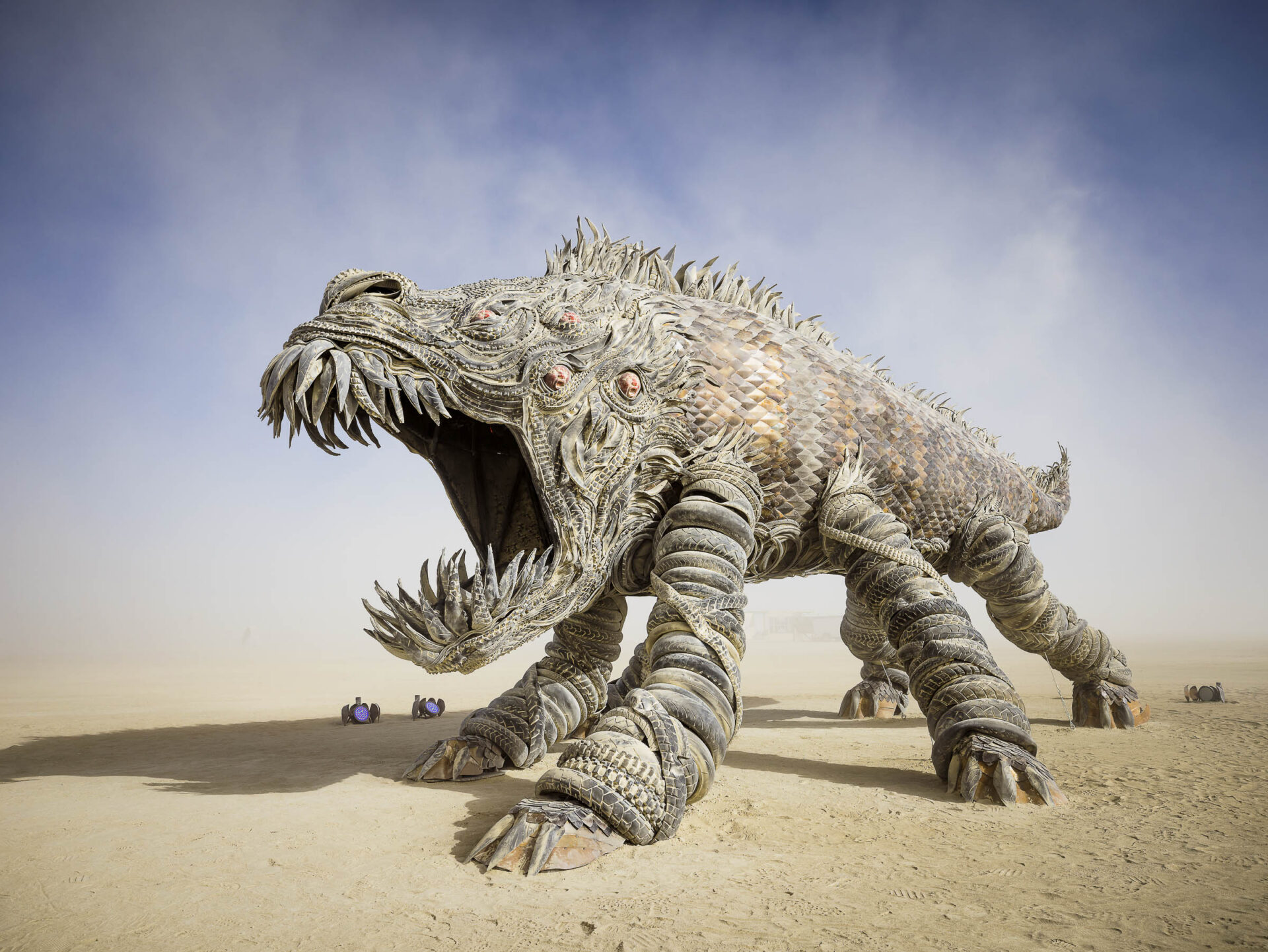 Sculpture of a five legged monster roaring
