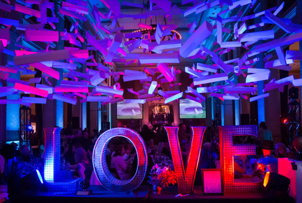 Installation by Paul Hayes (hanging above,) and Love by Laura Kimpton at the Artumnal Gathering, 2013. Photo courtesy of Marco Sanchez (marcosanchez.net)